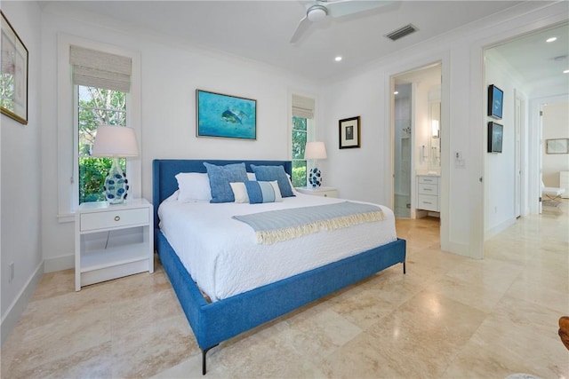 bedroom featuring visible vents, baseboards, ornamental molding, ensuite bath, and a ceiling fan