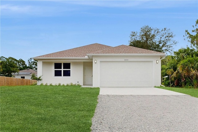 8050 97th Ct, Vero Beach, FL 32967 - ranch-style house with driveway, stucco siding, a garage, and a shingled roof
