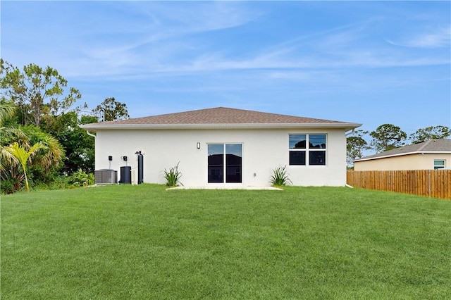 8050 97th Ct, Vero Beach, FL 32967 - back of property featuring stucco siding and cooling unit