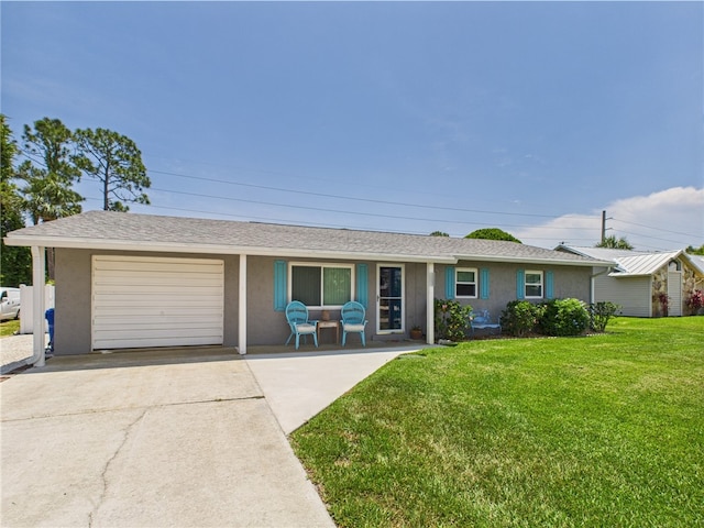249 Columbus St, Sebastian, FL 32958 - ranch-style home with concrete driveway, a garage, stucco siding, and a front lawn