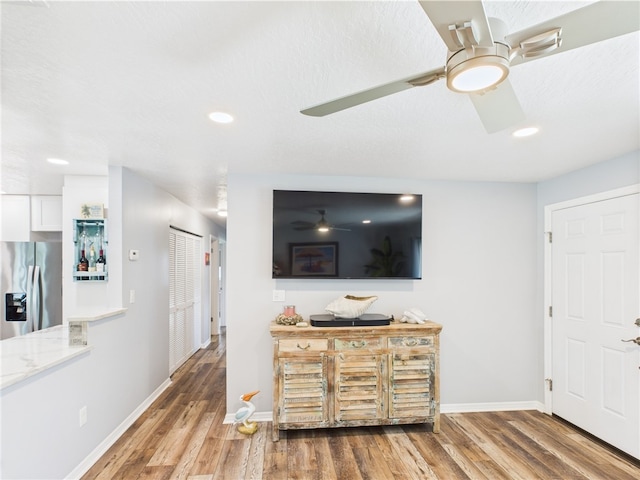 249 Columbus St, Sebastian, FL 32958 - living area featuring ceiling fan, wood finished floors, baseboards, and recessed lighting