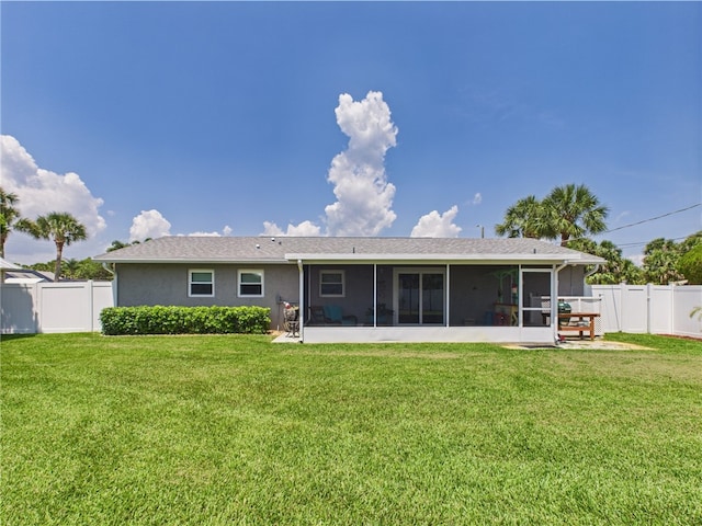 249 Columbus St, Sebastian, FL 32958 - back of property featuring a sunroom and stucco siding