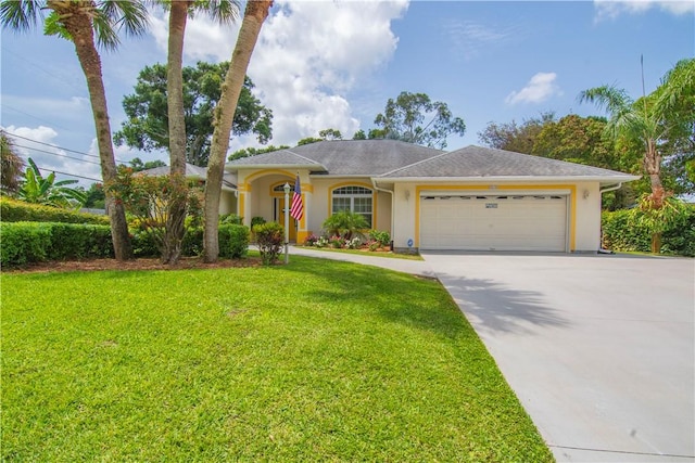 2615 15th St, Vero Beach, FL 32960 - ranch-style house featuring an attached garage, a front yard, concrete driveway, and stucco siding