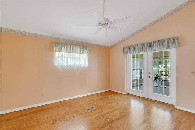 2615 15th St, Vero Beach, FL 32960 - empty room featuring french doors, wood finished floors, vaulted ceiling, and ceiling fan