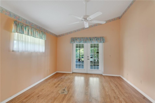 2615 15th St, Vero Beach, FL 32960 - empty room featuring wood finished floors, a ceiling fan, vaulted ceiling, and french doors