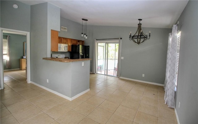 kitchen with light tile patterned floors, black fridge with ice dispenser, decorative light fixtures, and kitchen peninsula