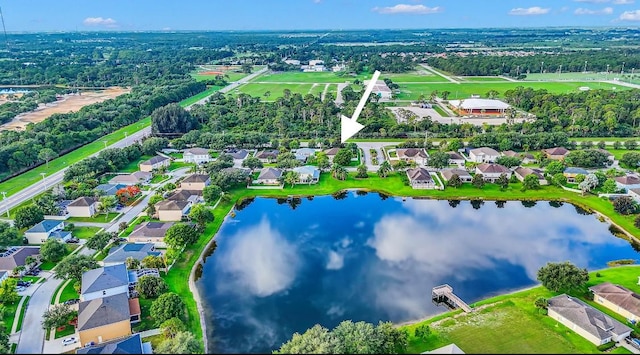 6057 Ridge Lake Cir, Vero Beach, FL 32967 - aerial perspective of suburban area featuring a nearby body of water