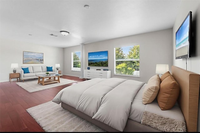 6057 Ridge Lake Cir, Vero Beach, FL 32967 - bedroom featuring wood finished floors and baseboards
