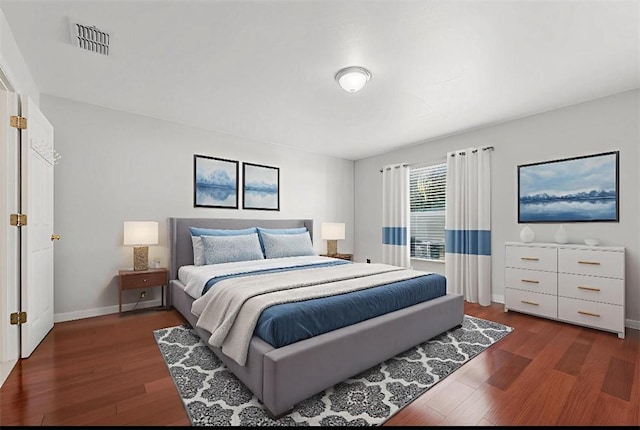 6057 Ridge Lake Cir, Vero Beach, FL 32967 - bedroom with wood finished floors