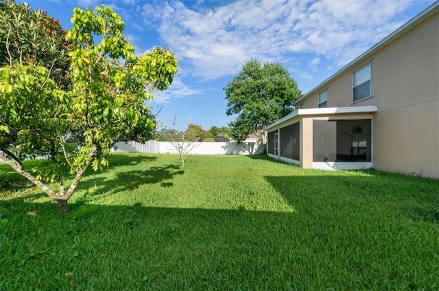 6057 Ridge Lake Cir, Vero Beach, FL 32967 - view of yard with a sunroom