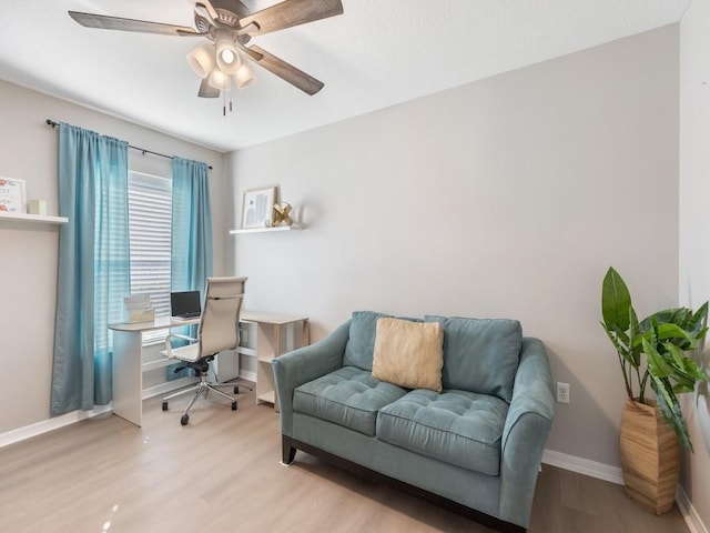 home office with wood finished floors, baseboards, and ceiling fan