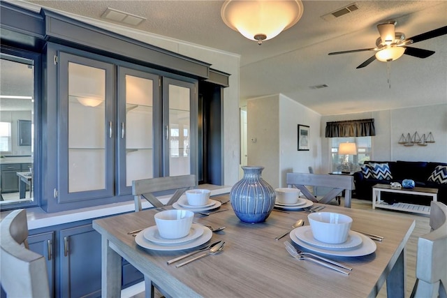 7519 Chasta Rd Unit 0, Micco, FL 32976 - dining area with a ceiling fan and wood finished floors