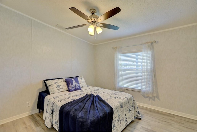 7519 Chasta Rd Unit 0, Micco, FL 32976 - bedroom with crown molding, wood finished floors, a ceiling fan, and baseboards