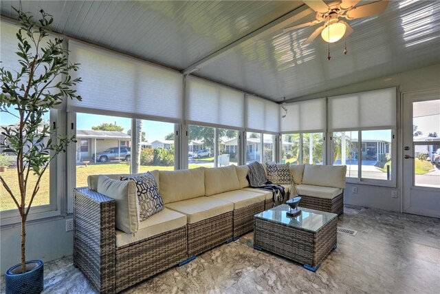7519 Chasta Rd Unit 0, Micco, FL 32976 - sunroom / solarium with healthy amount of natural light, a ceiling fan, an outdoor hangout area, and lofted ceiling