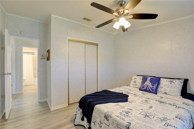 7519 Chasta Rd Unit 0, Micco, FL 32976 - bedroom with light wood-style floors, crown molding, a closet, ceiling fan, and baseboards