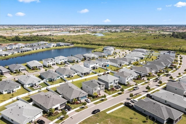 drone / aerial view featuring a water view