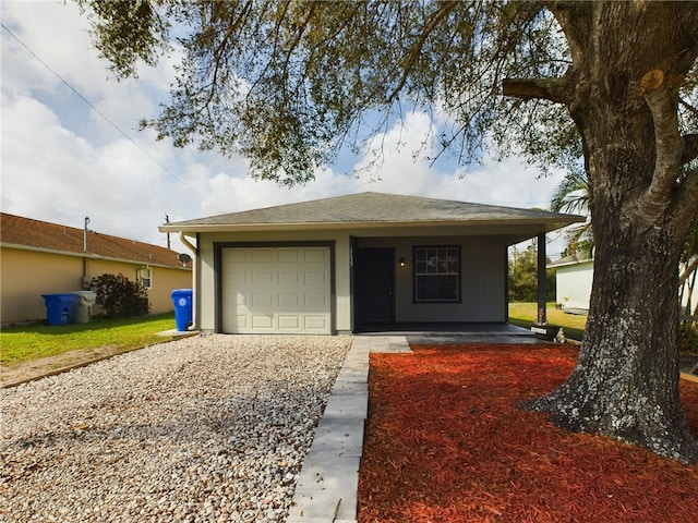 single story home with a garage