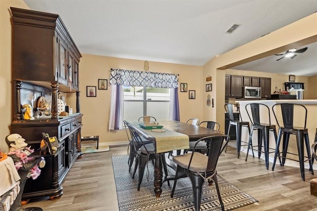 dining room with light wood-type flooring