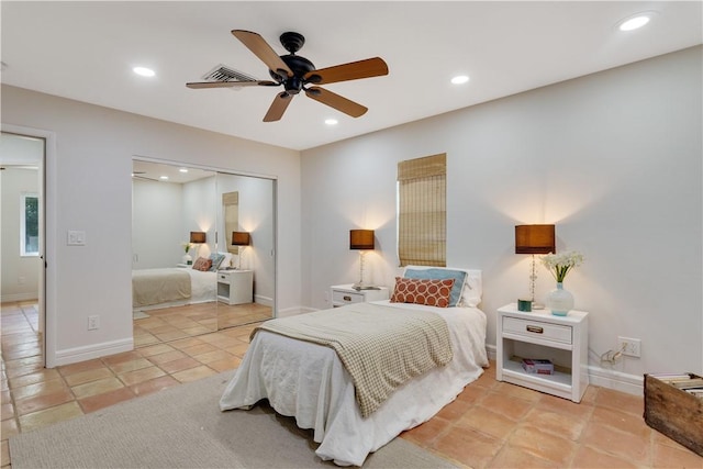 bedroom featuring a closet and ceiling fan