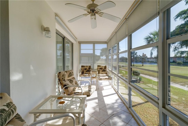 sunroom / solarium with ceiling fan