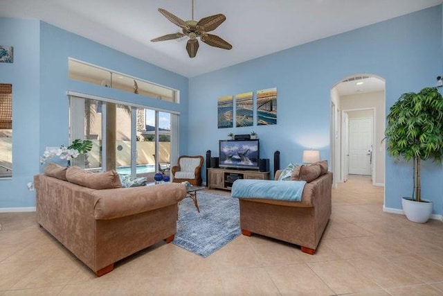 living room with ceiling fan and light tile patterned floors