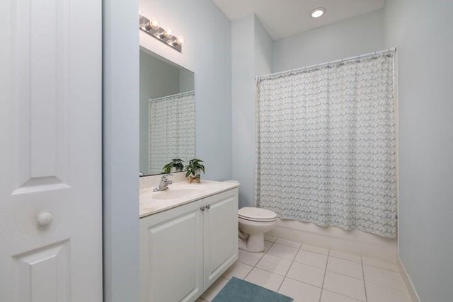 full bathroom with tile patterned floors, vanity, shower / bath combination with curtain, and toilet