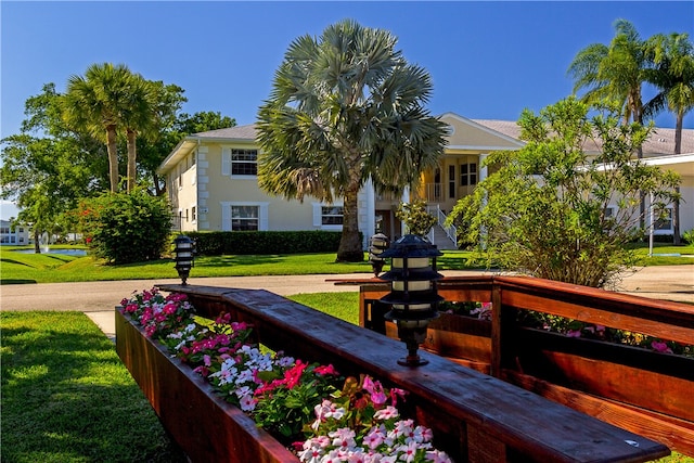 surrounding community featuring a lawn