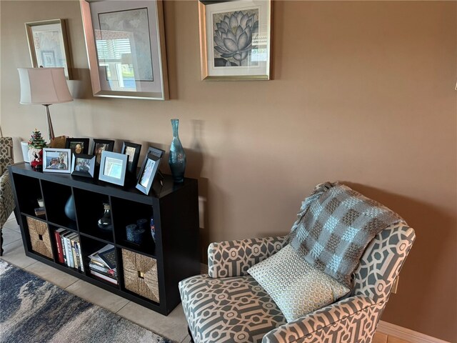 sitting room with light tile patterned floors