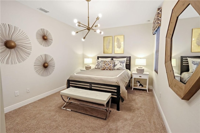 carpeted bedroom featuring a chandelier