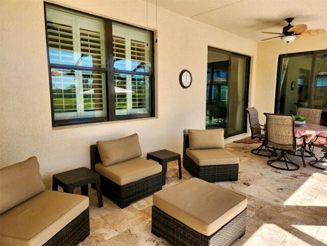6210 Arcadia Sq, Vero Beach, FL 32966 - view of patio with outdoor lounge area, a ceiling fan, and outdoor dining area