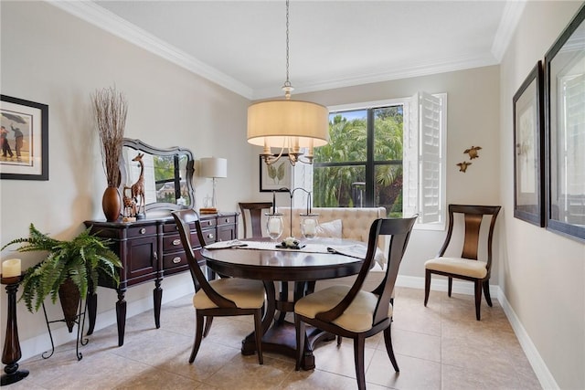 tiled dining room featuring ornamental molding