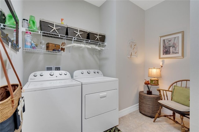 laundry area with separate washer and dryer