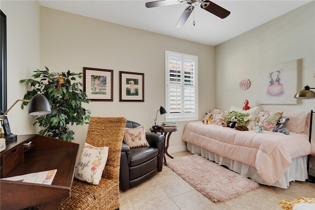 bedroom with ceiling fan and light tile patterned floors