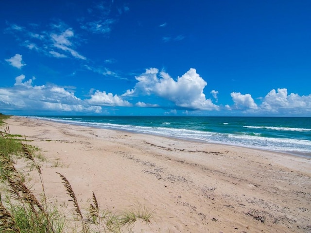 property view of water with a beach view