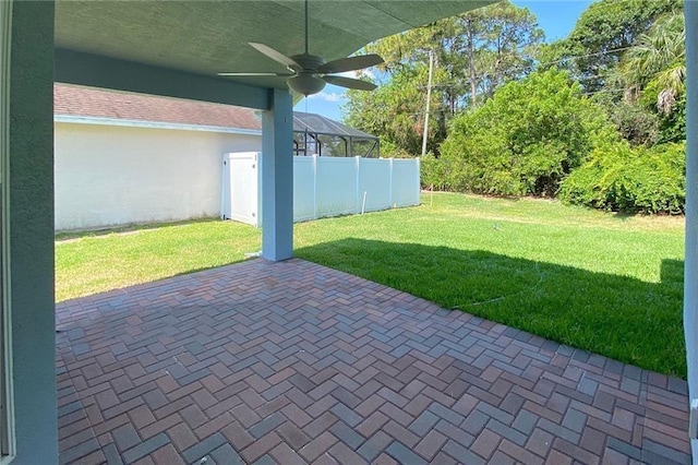 view of patio / terrace featuring ceiling fan