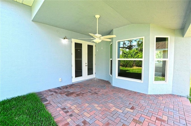 view of patio with ceiling fan and french doors