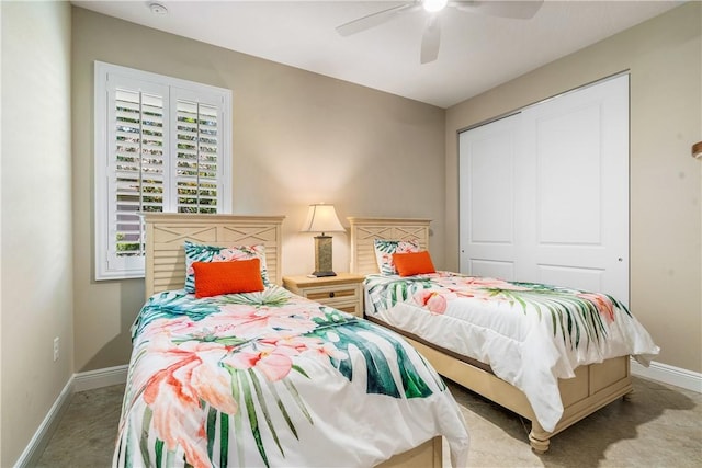 bedroom with light carpet, a closet, and ceiling fan