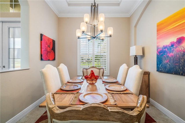 dining room featuring crown molding and a notable chandelier