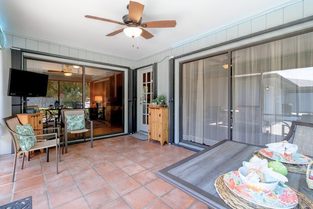 interior space featuring ceiling fan