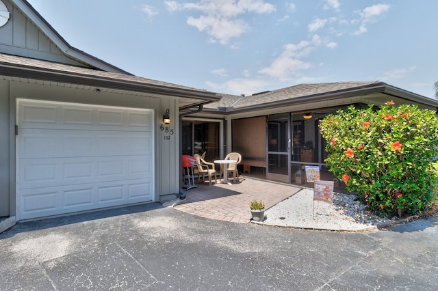 exterior space featuring a garage