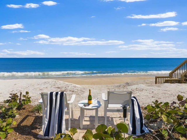 property view of water featuring a view of the beach