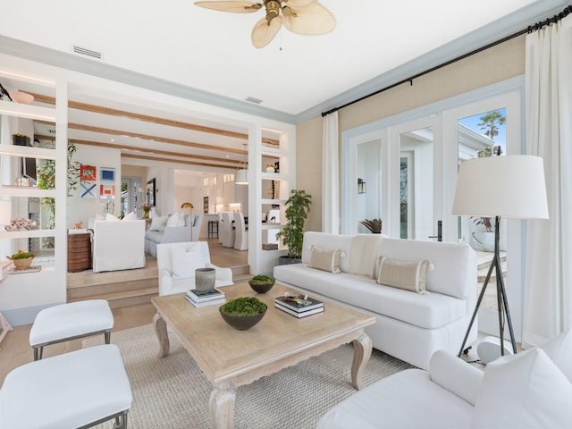 kitchen with wine cooler, white cabinetry, light hardwood / wood-style flooring, beam ceiling, and oven