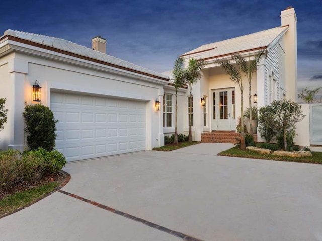 view of front of home with a garage