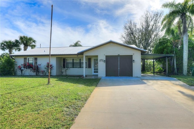 single story home featuring a garage, a front lawn, and a carport