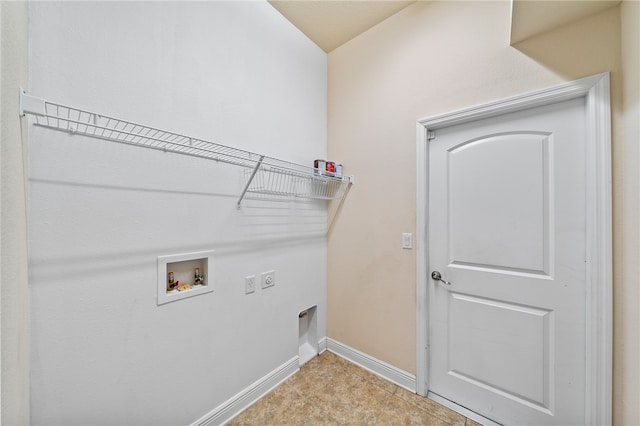 clothes washing area featuring washer hookup and hookup for an electric dryer