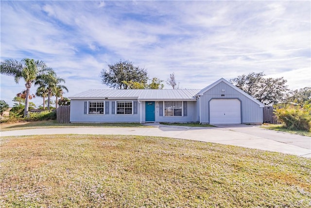 ranch-style home with a garage and a front yard