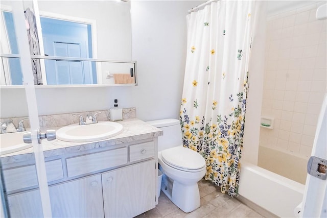 full bathroom featuring tile patterned flooring, vanity, shower / bath combination with curtain, and toilet