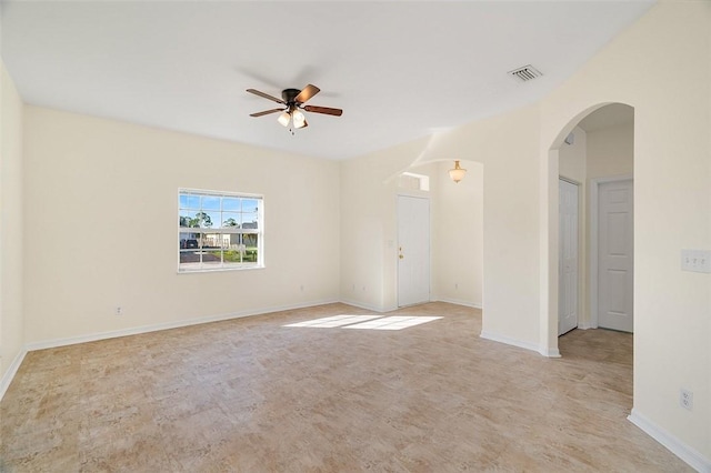 spare room with ceiling fan