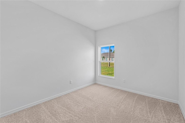 9316 104th Ave, Vero Beach, FL 32967 - carpeted spare room with baseboards