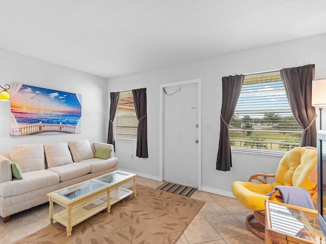 living room with light tile patterned floors